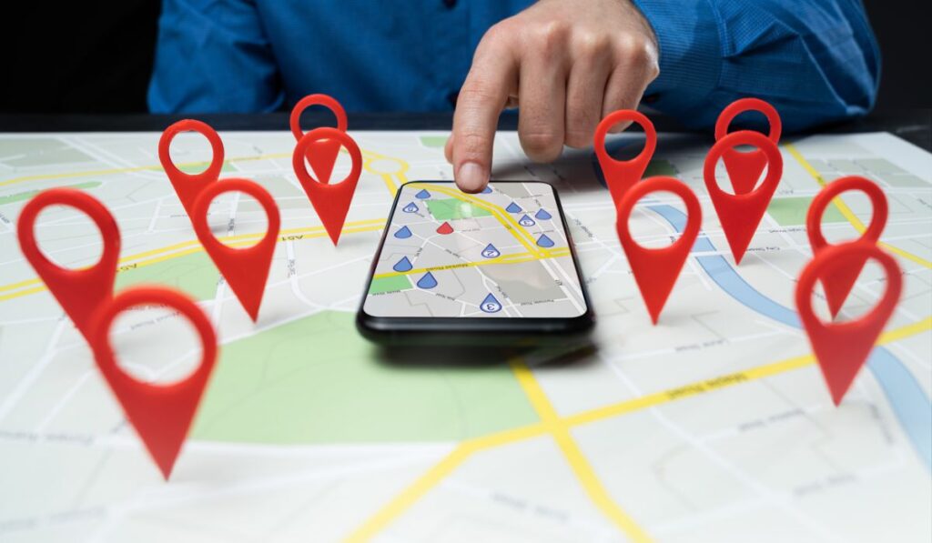 Zen 9 Marketing Local SEO phone with location tags on the screen