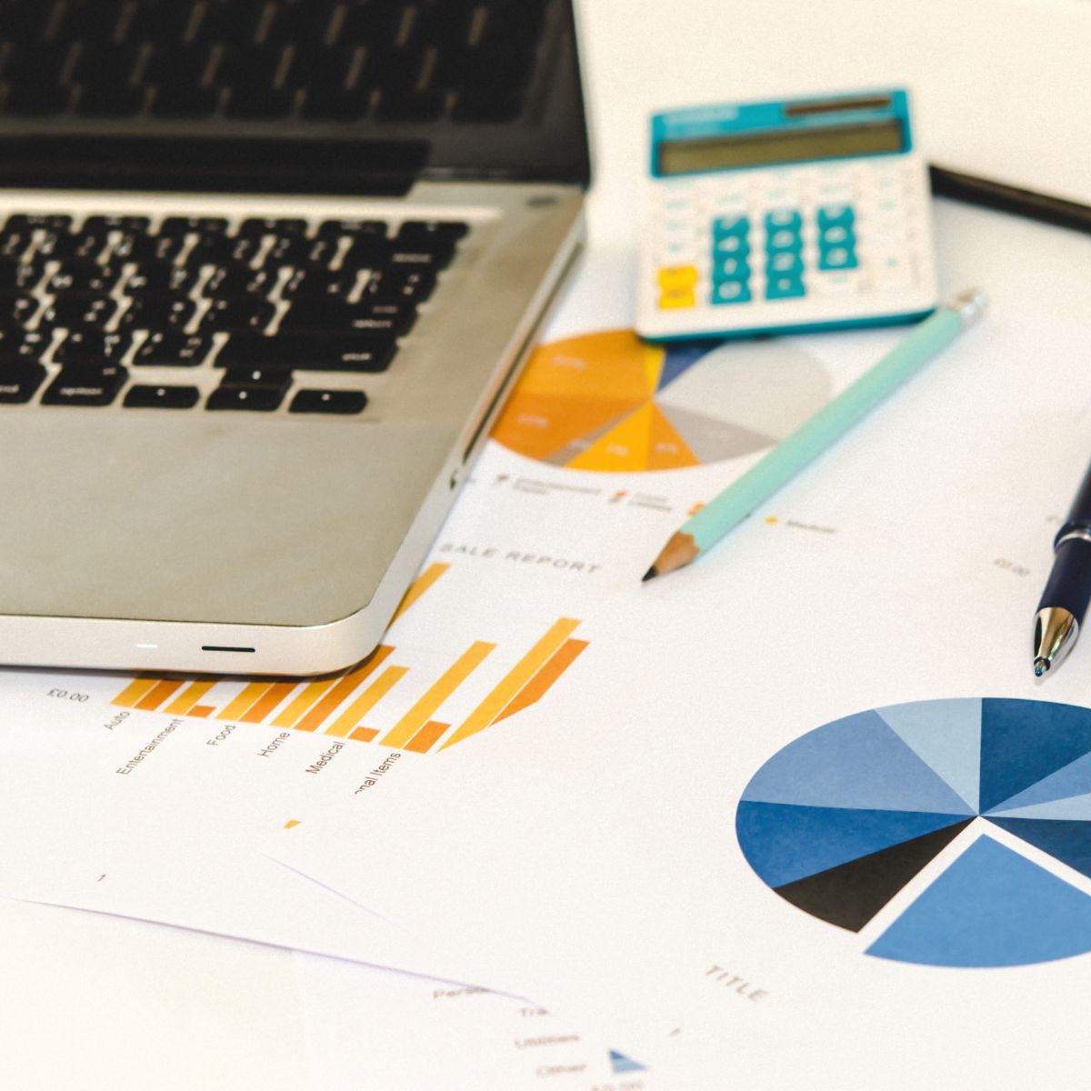 Canva-Zen 9 Marketing Square Laptop and analytics on a desk of a marketing agency