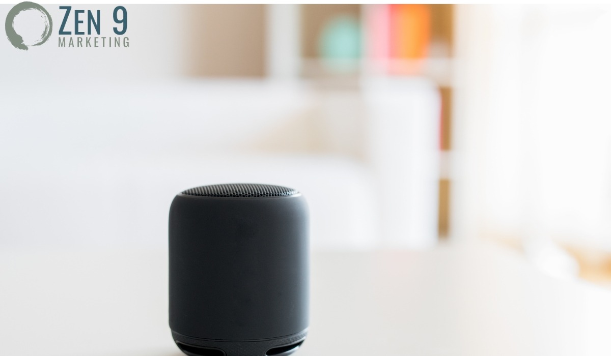 Black Smart Speaker on an end table