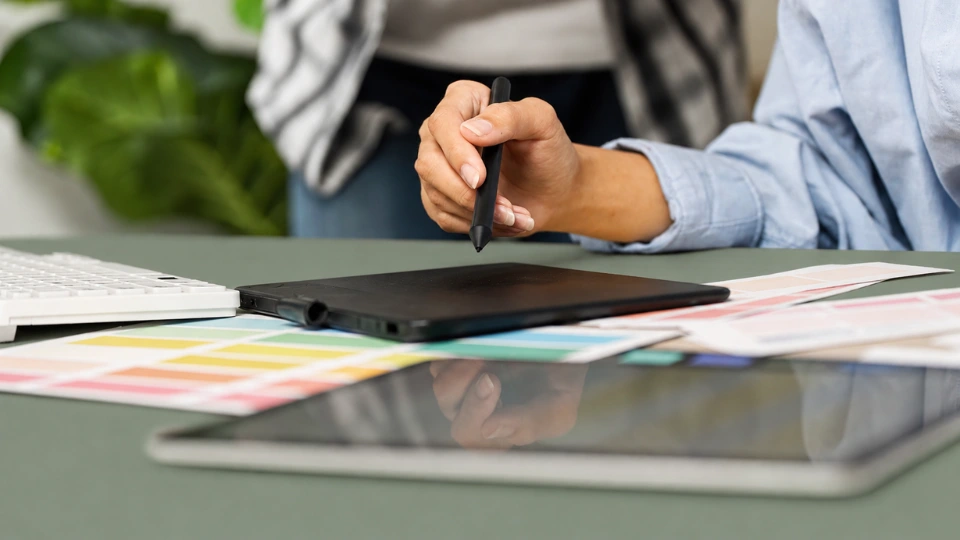 A person reviewing a website on a laptop at a modern desk, with a privacy consent banner visible on screen, representing CCPA compliance and website tracking for small businesses.